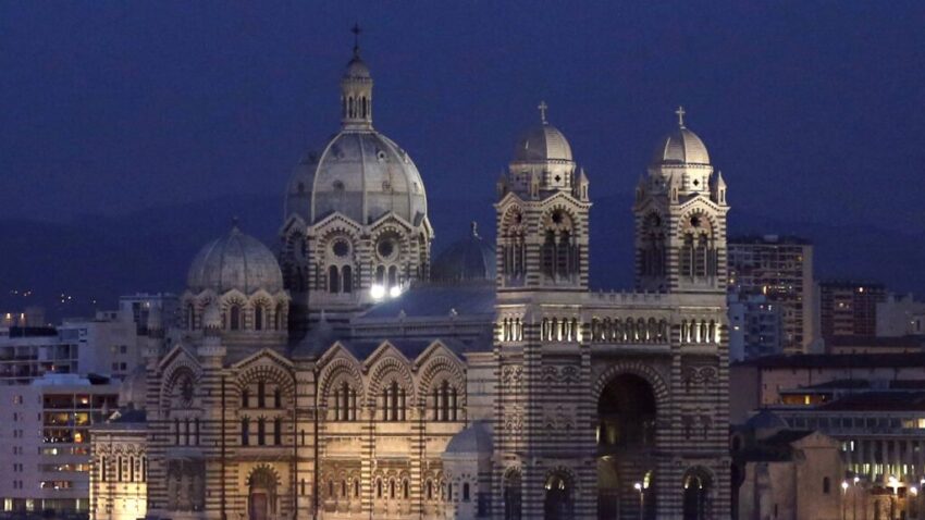 A file photo shows the Marseille cathedral illuminated in France. In a rather unusual moment for secular France, President Emmanuel Macron confirmed he will attend Mass celebrated by Pope Francis in Marseille Sept. 23, 2023. (OSV News photo/Jean-Paul Pelissier, Reuters)